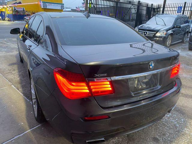 used 2015 BMW 750 car, priced at $11,900