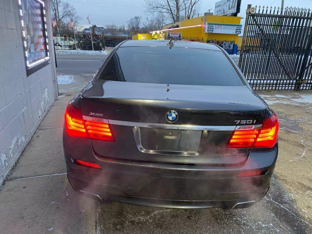 used 2015 BMW 750 car, priced at $11,900