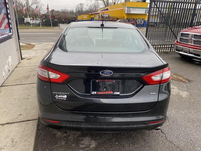 used 2015 Ford Fusion car, priced at $5,700