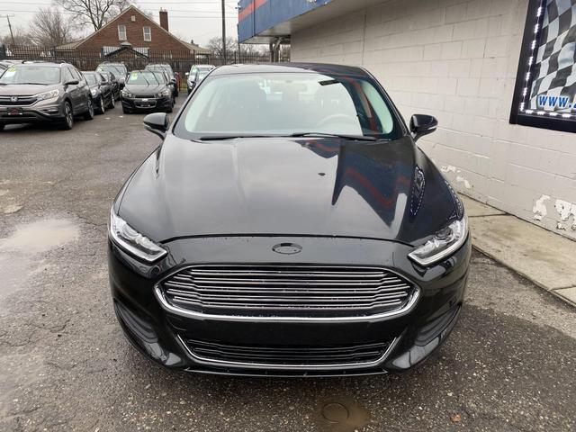 used 2015 Ford Fusion car, priced at $5,700