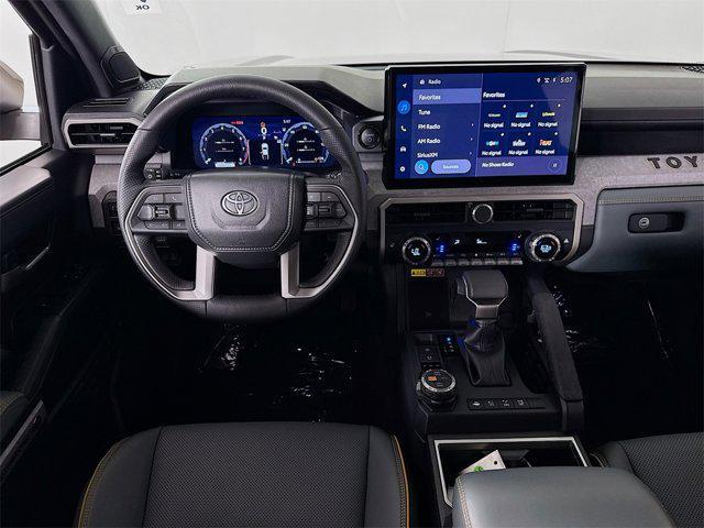used 2025 Toyota Tacoma Hybrid car, priced at $64,495