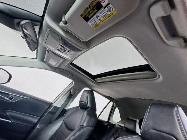 used 2021 Toyota RAV4 Hybrid car, priced at $28,495