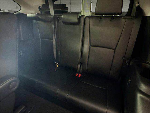 used 2025 Toyota Highlander Hybrid car, priced at $52,995
