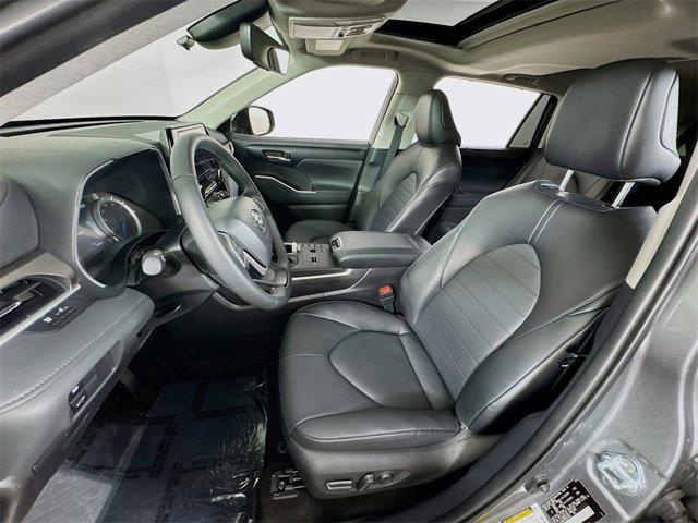 used 2025 Toyota Highlander Hybrid car, priced at $52,995