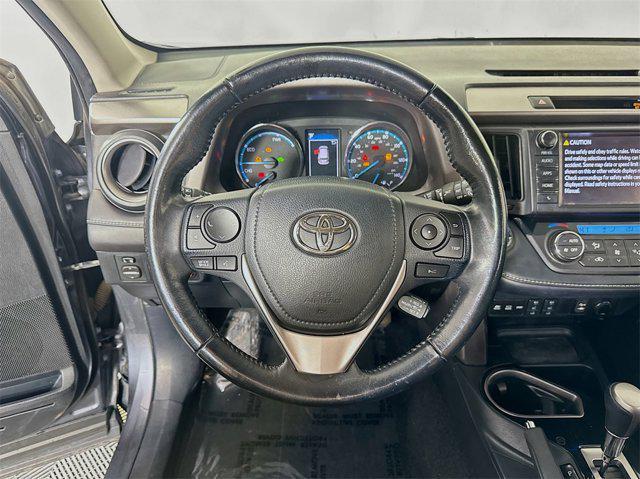 used 2018 Toyota RAV4 Hybrid car, priced at $23,995