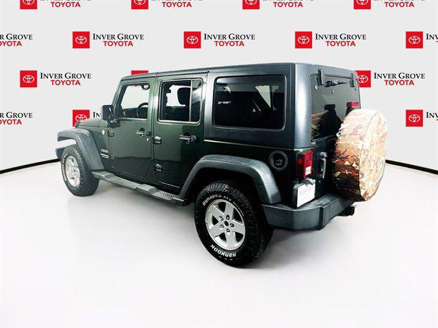 used 2011 Jeep Wrangler Unlimited car, priced at $12,595