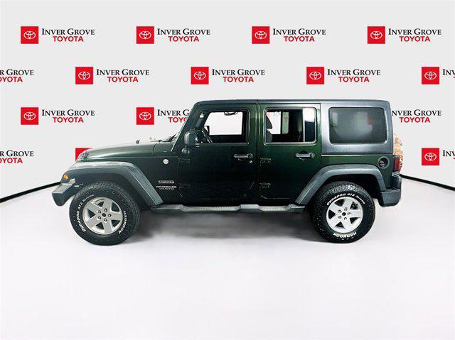 used 2011 Jeep Wrangler Unlimited car, priced at $12,595