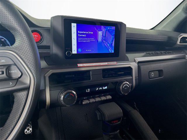 used 2025 Toyota Tacoma car, priced at $50,595
