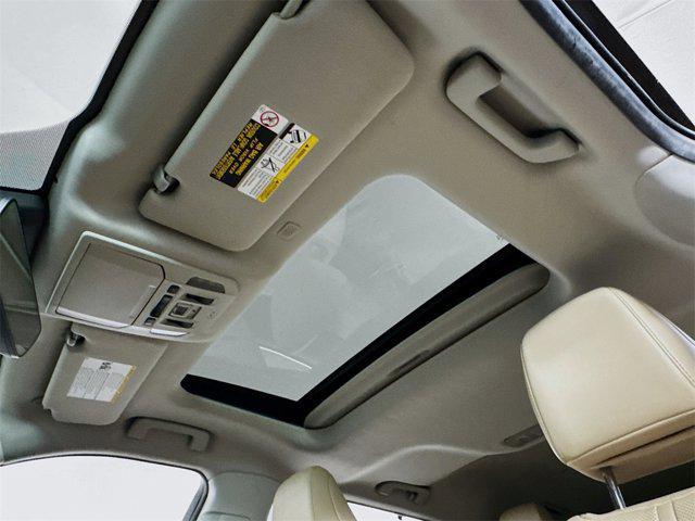 used 2022 Toyota Highlander Hybrid car, priced at $41,995