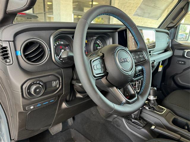 new 2024 Jeep Wrangler 4xe car, priced at $57,158