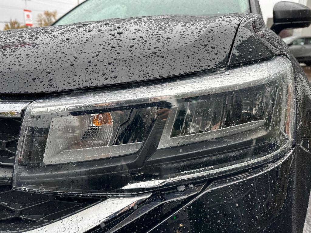 used 2023 Volkswagen Taos car, priced at $22,213