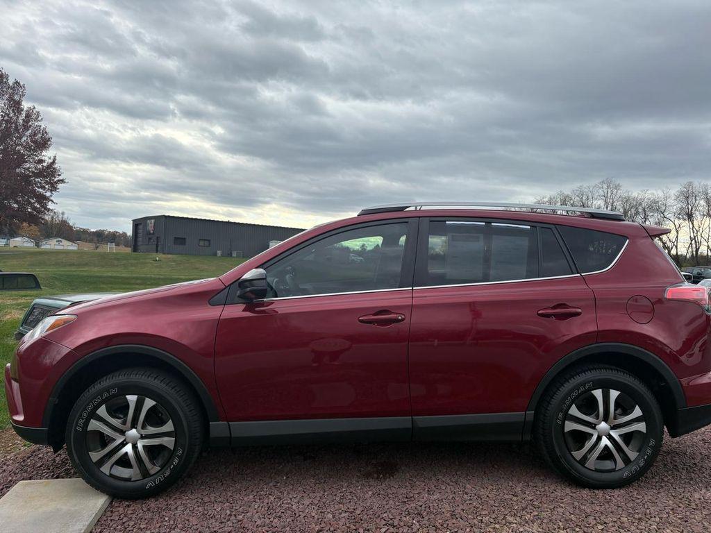 used 2018 Toyota RAV4 car, priced at $14,995