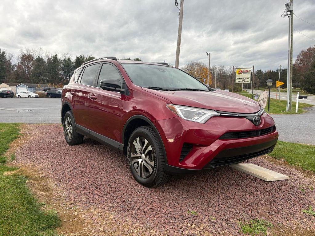 used 2018 Toyota RAV4 car, priced at $14,995