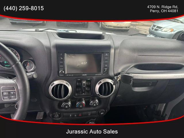 used 2011 Jeep Wrangler Unlimited car, priced at $10,995