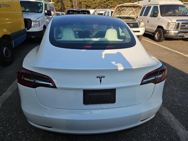 used 2021 Tesla Model 3 car, priced at $22,000