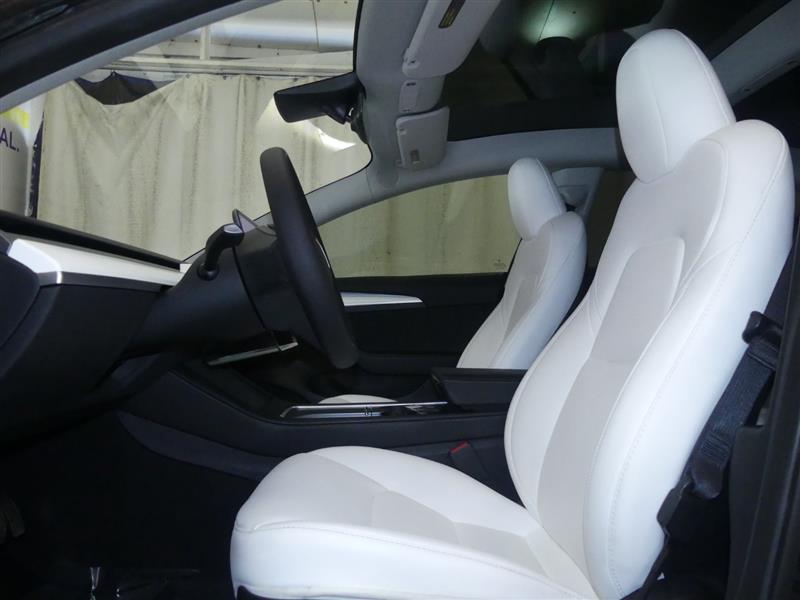 used 2023 Tesla Model 3 car, priced at $20,000