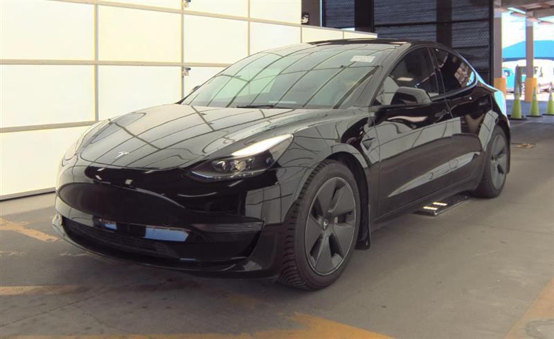 used 2023 Tesla Model 3 car, priced at $20,000