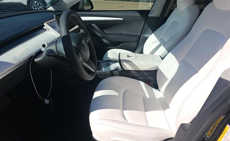 used 2023 Tesla Model 3 car, priced at $20,000