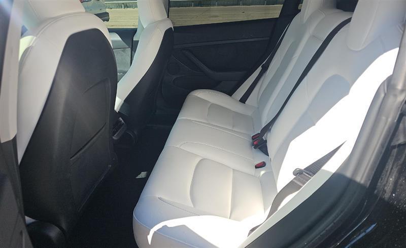 used 2023 Tesla Model 3 car, priced at $20,000