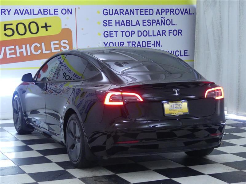 used 2023 Tesla Model 3 car, priced at $20,000