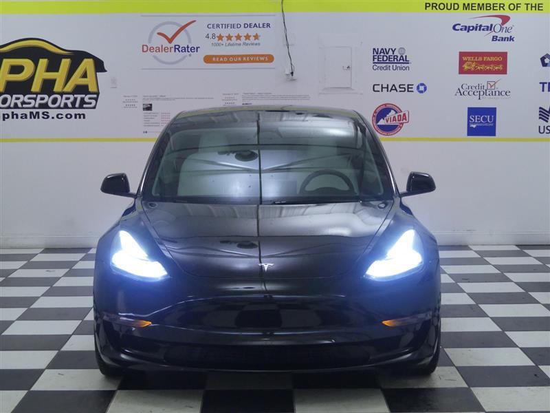 used 2023 Tesla Model 3 car, priced at $20,000