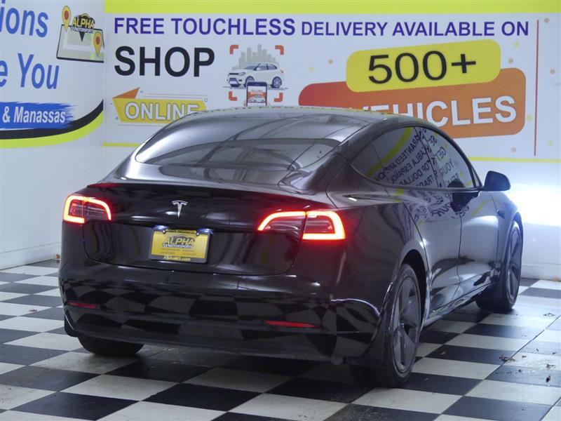 used 2023 Tesla Model 3 car, priced at $20,000