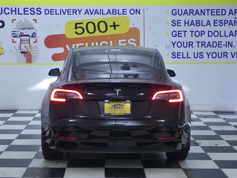 used 2023 Tesla Model 3 car, priced at $20,000