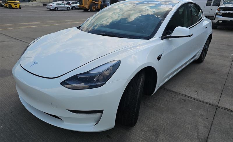 used 2023 Tesla Model 3 car, priced at $21,900