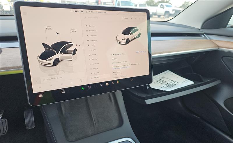 used 2023 Tesla Model 3 car, priced at $21,900