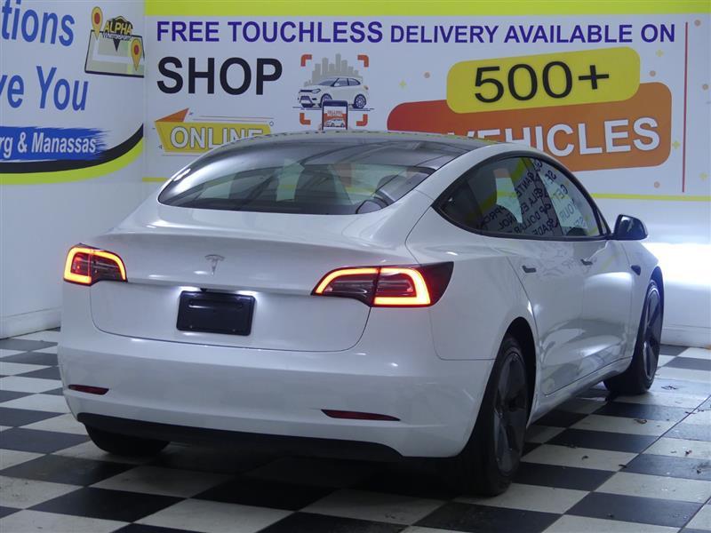 used 2023 Tesla Model 3 car, priced at $21,900