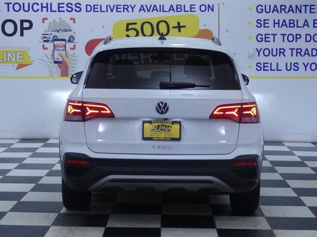 used 2023 Volkswagen Taos car, priced at $18,500