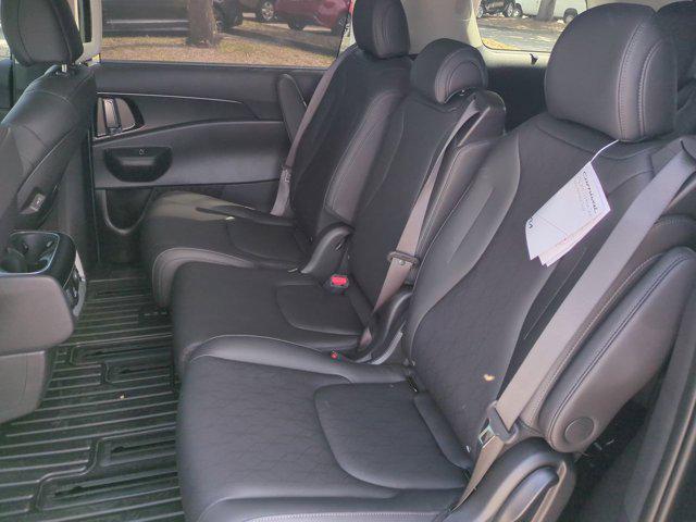 new 2025 Kia Carnival Hybrid car, priced at $48,487