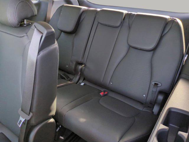 new 2025 Kia Carnival Hybrid car, priced at $53,174