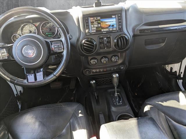 used 2015 Jeep Wrangler Unlimited car, priced at $20,255