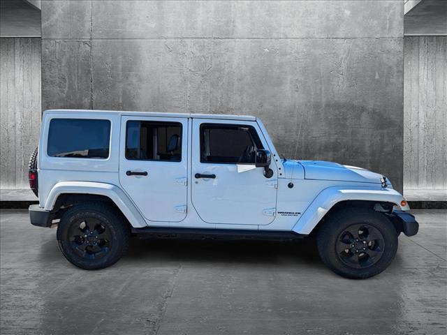 used 2015 Jeep Wrangler Unlimited car, priced at $20,255