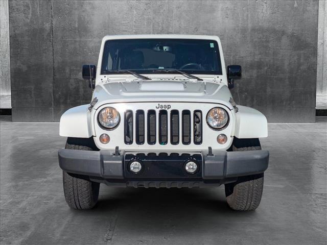 used 2015 Jeep Wrangler Unlimited car, priced at $20,255