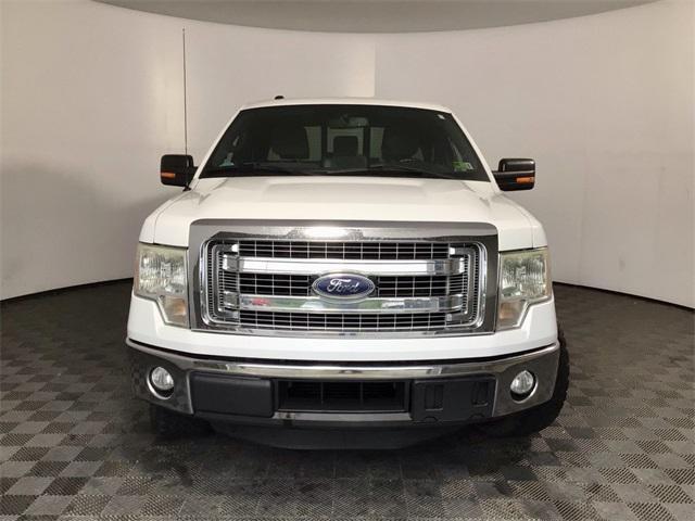 used 2014 Ford F-150 car, priced at $10,000