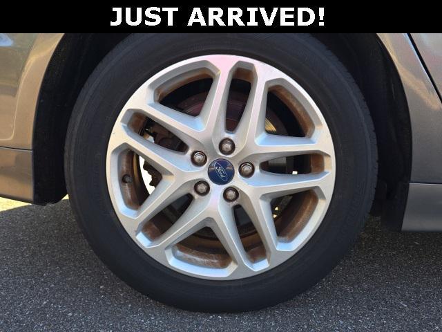 used 2014 Ford Fusion car, priced at $9,000