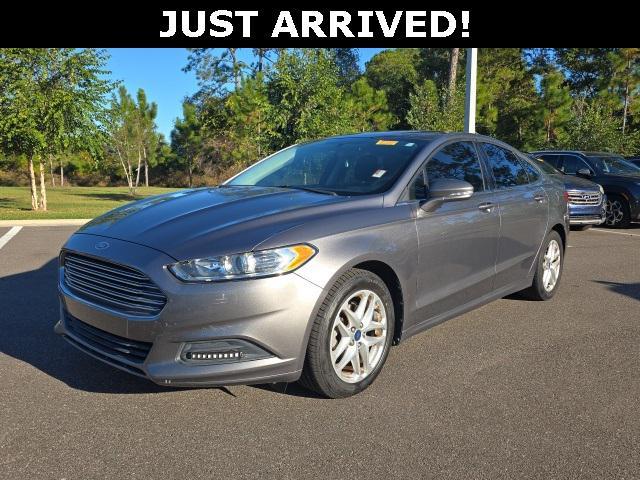 used 2014 Ford Fusion car, priced at $9,000