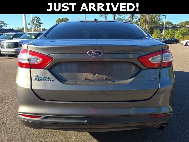 used 2014 Ford Fusion car, priced at $9,000