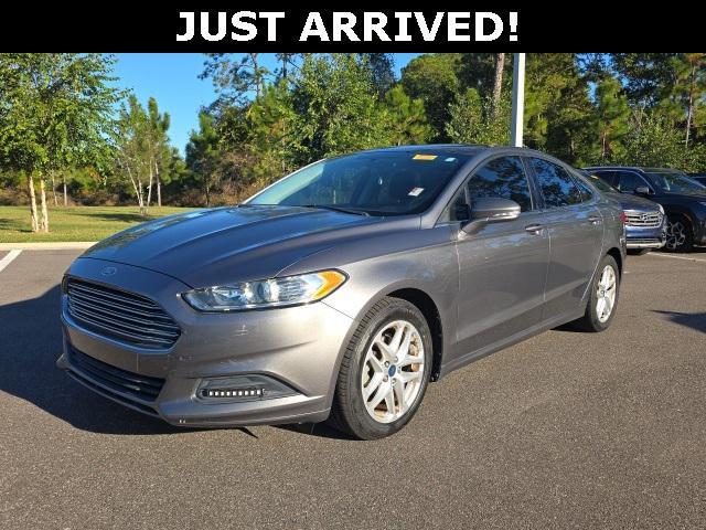 used 2014 Ford Fusion car, priced at $9,000