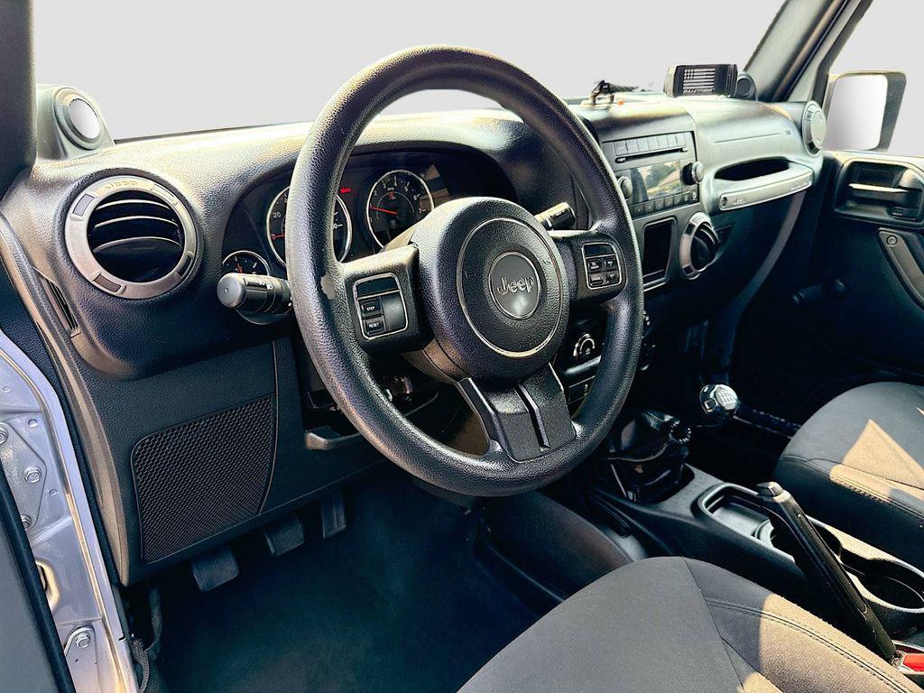 used 2014 Jeep Wrangler Unlimited car, priced at $12,000