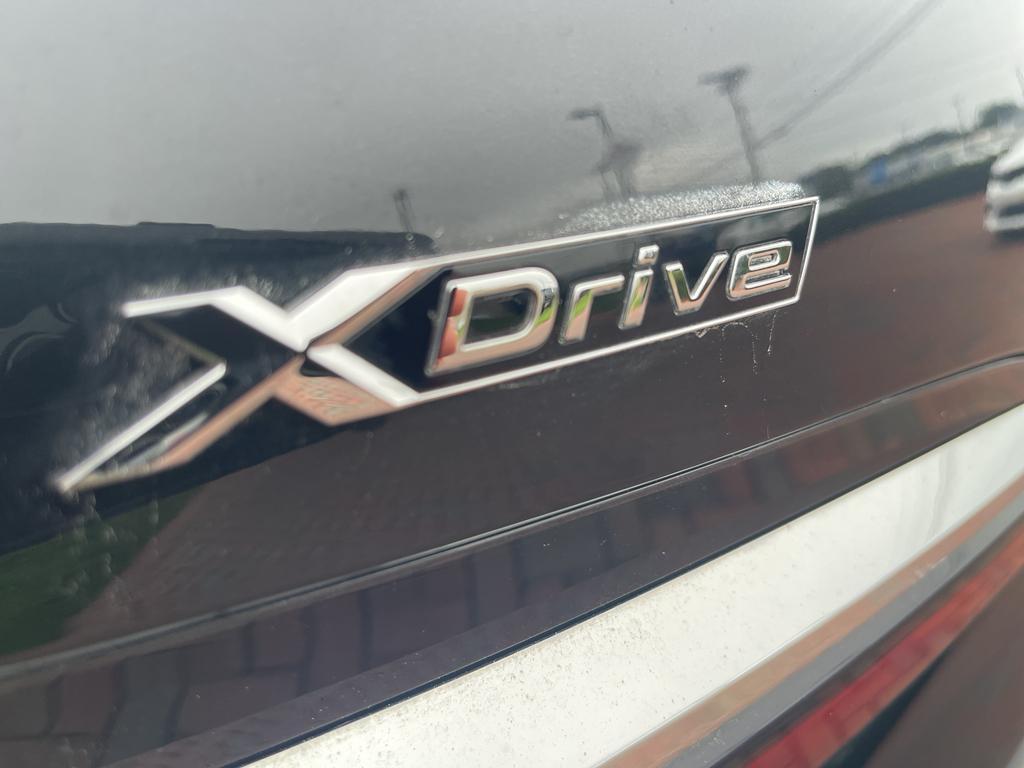 used 2024 BMW 740 car, priced at $68,500