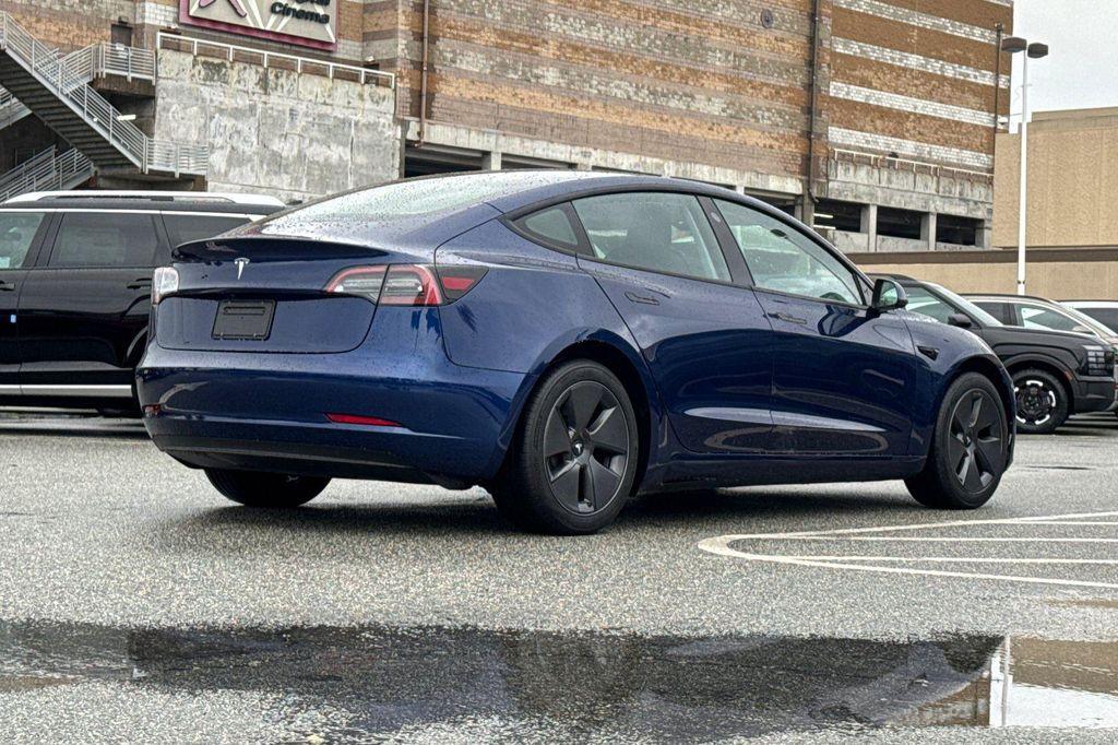 used 2023 Tesla Model 3 car, priced at $24,845