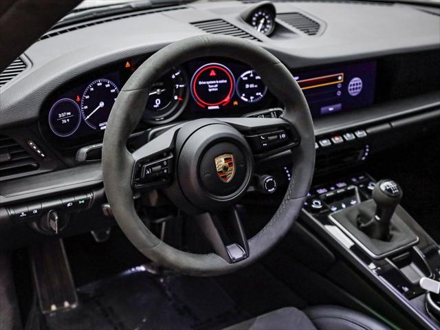 used 2023 Porsche 911 car, priced at $204,898