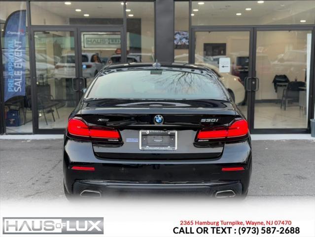 used 2021 BMW 530 car, priced at $27,995