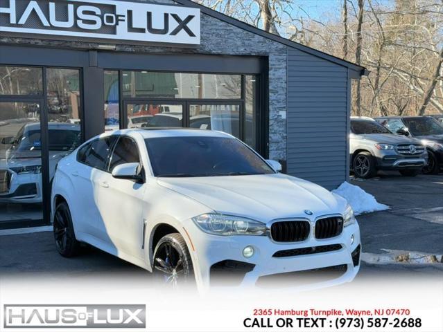 used 2016 BMW X6 M car, priced at $25,995