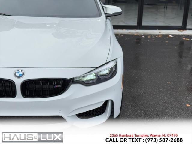 used 2019 BMW M4 car, priced at $43,995