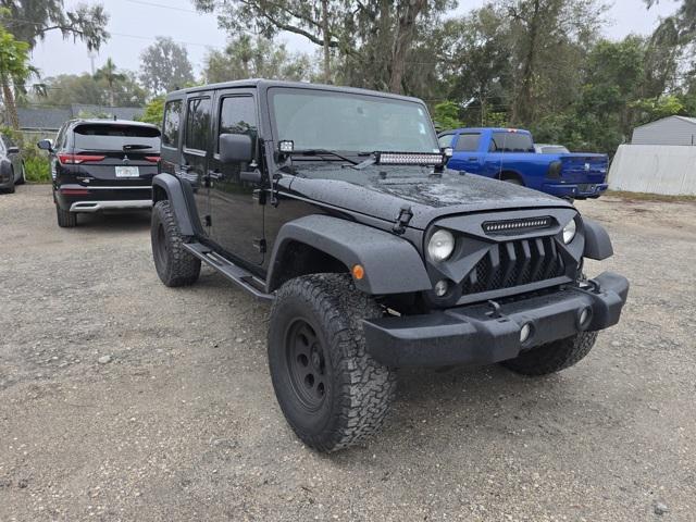 used 2014 Jeep Wrangler Unlimited car, priced at $20,463