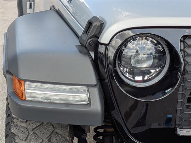 used 2023 Jeep Wrangler 4xe car, priced at $29,936